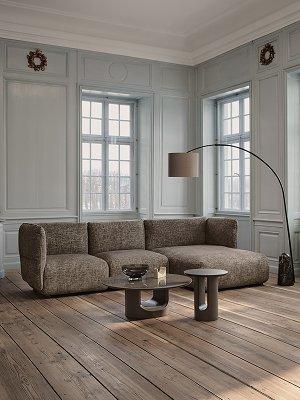 Bergamo chaise longue sofa in gray textured fabric styled with cozy blankets and cushions